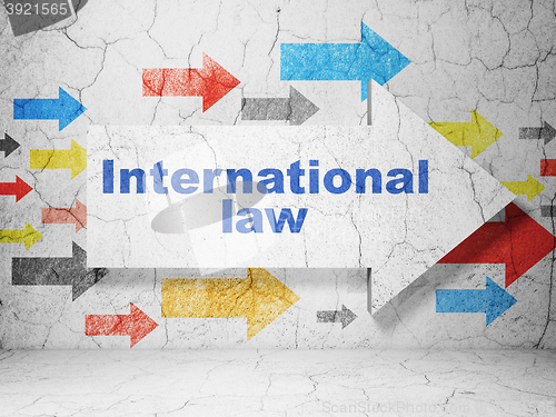 Image of Political concept: arrow with International Law on grunge wall background