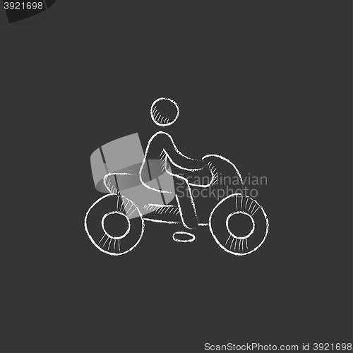 Image of Man riding motorcycle. Drawn in chalk icon.