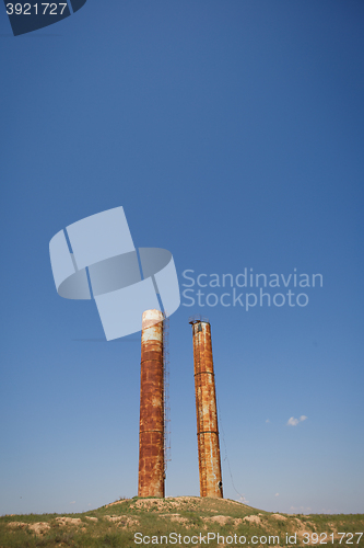 Image of old industrial chimney on the hill