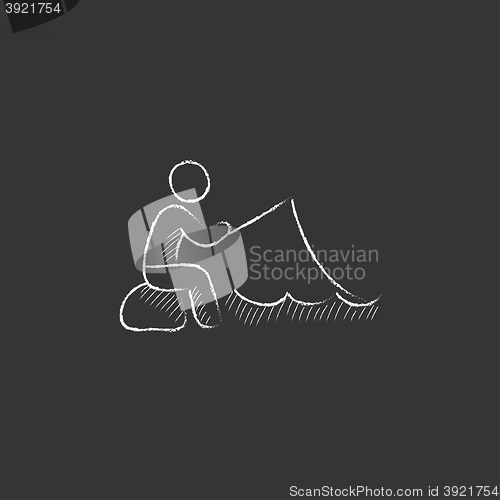 Image of Fisherman sitting with rod. Drawn in chalk icon.