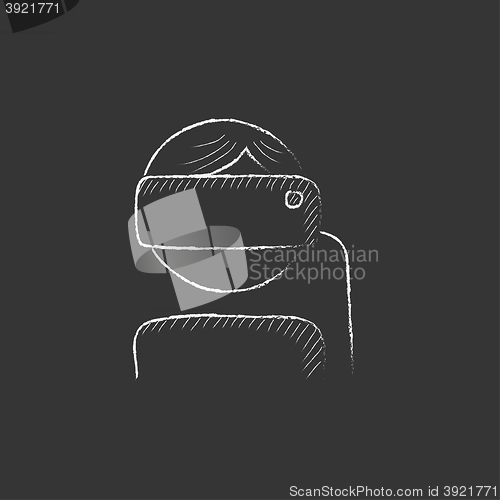 Image of Man wearing virtual reality headset. Drawn in chalk icon.