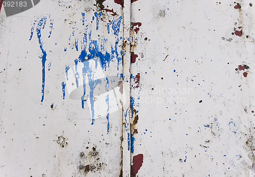 Image of Grungy metal texture with paint splash on