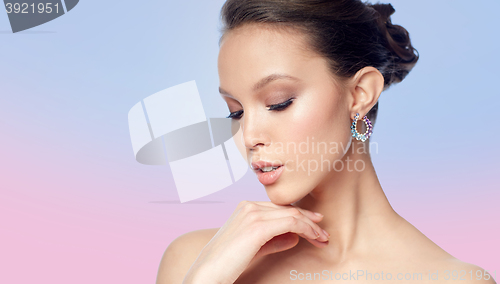 Image of close up of beautiful woman face with earring