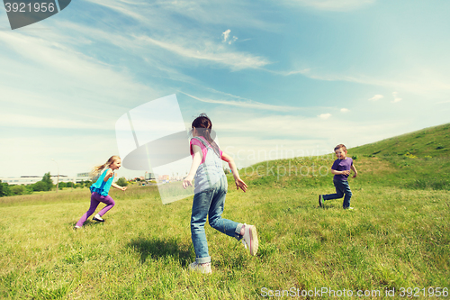 Image of group of happy kids running outdoors