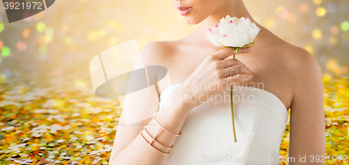 Image of close up of beautiful woman with ring and bracelet