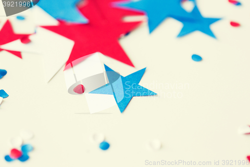 Image of stars confetti on american independence day party