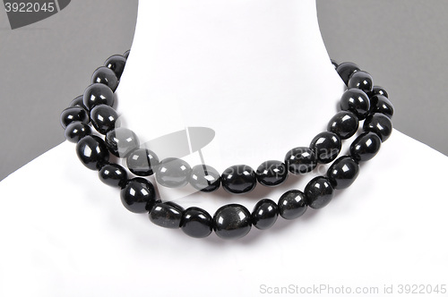 Image of Rock crystal and snowflake obsidian chain on bust