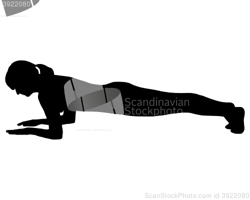 Image of Silhouette of woman doing exercises