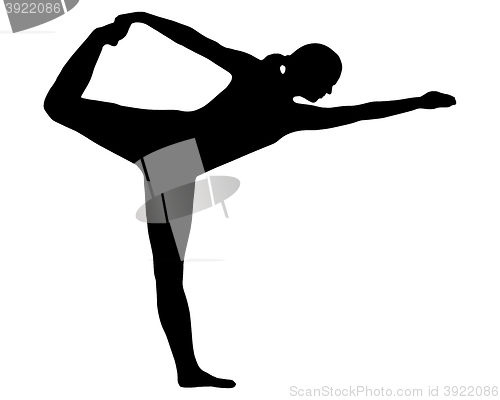 Image of Silhouette of woman doing yoga