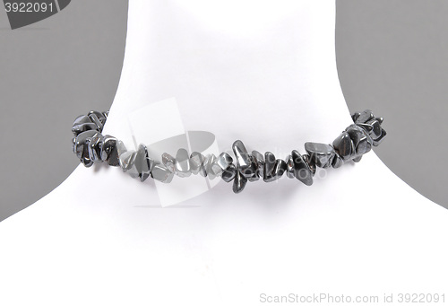 Image of Splintered hematite chain on bust