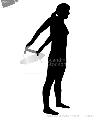 Image of Silhouette of woman doing exercises