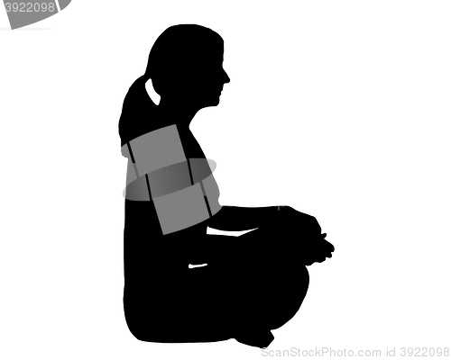 Image of Silhouette of woman doing yoga