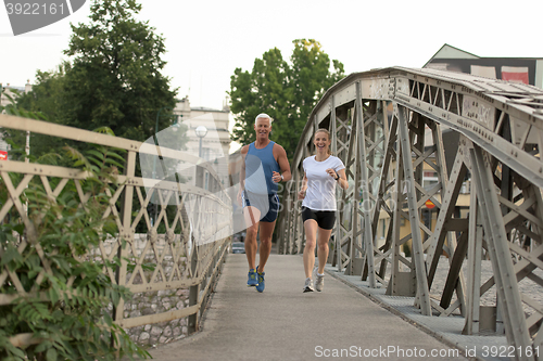 Image of couple jogging