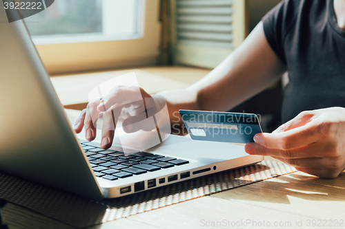 Image of the girl is shopping on the Internet