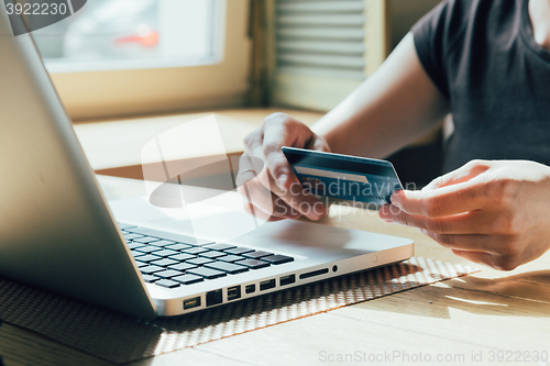 Image of the girl is shopping on the Internet