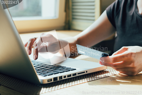 Image of the girl is shopping on the Internet