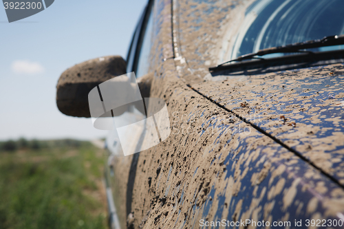 Image of car covered in dirt