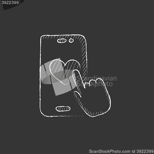 Image of Smartphone with heart sign. Drawn in chalk icon.