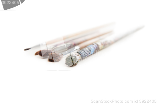 Image of Dirty used paintbrushes 