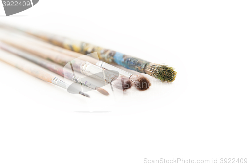 Image of Dirty used paintbrushes 