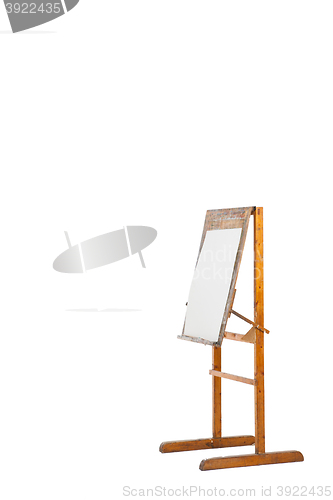 Image of Isolated easel with empty canvas