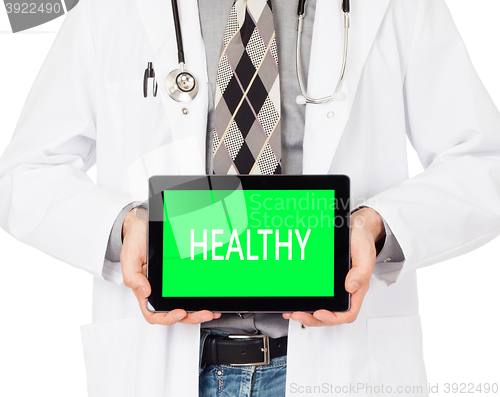 Image of Doctor holding tablet - Healthy