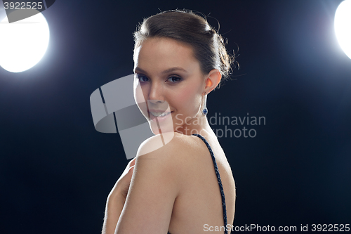 Image of beautiful young asian woman with earring