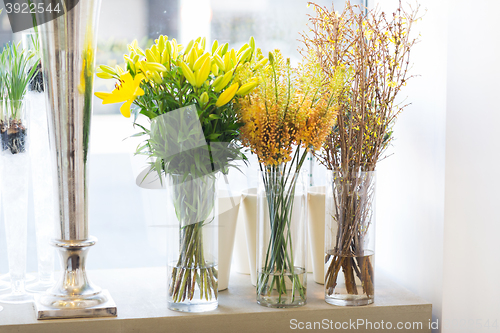 Image of close up of flowers in vases at flower shop