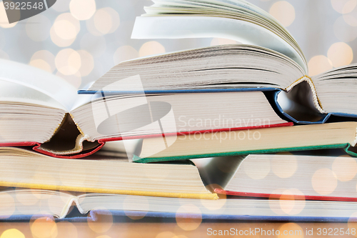 Image of close up of books on wooden table