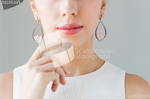 Image of close up of beautiful woman face with earrings
