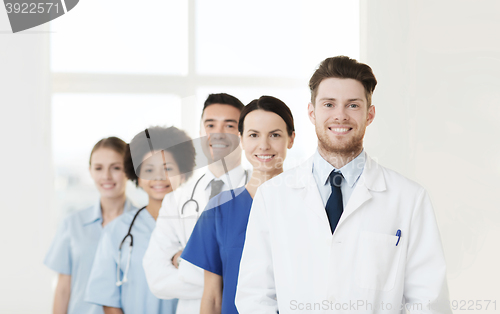 Image of group of happy doctors at hospital