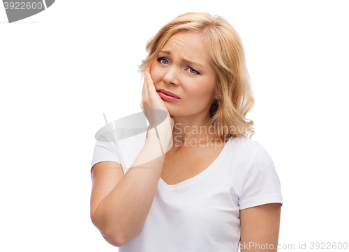 Image of unhappy woman suffering toothache