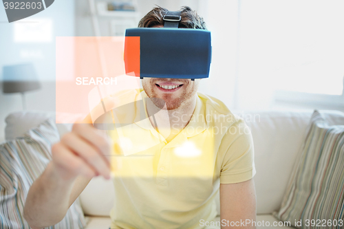 Image of young man in virtual reality headset or 3d glasses