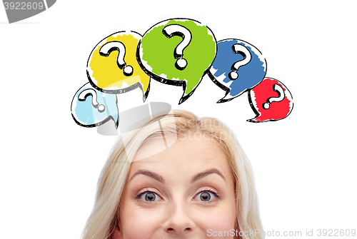 Image of happy young woman head with question marks