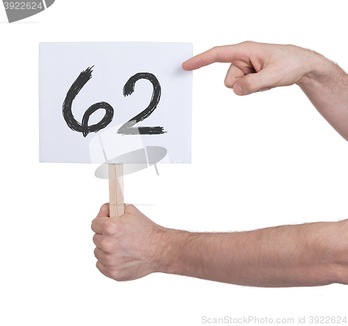 Image of Sign with a number, 62