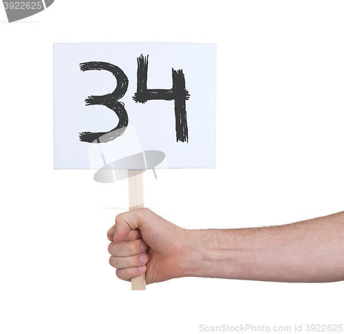 Image of Sign with a number, 34