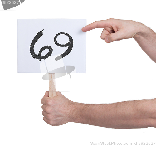 Image of Sign with a number, 69