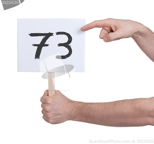 Image of Sign with a number, 73