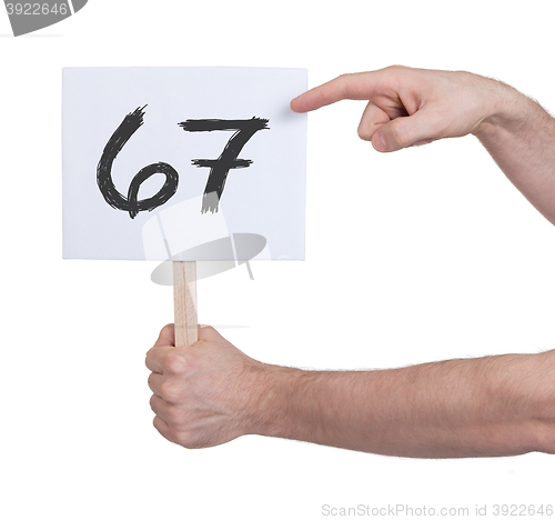 Image of Sign with a number, 67