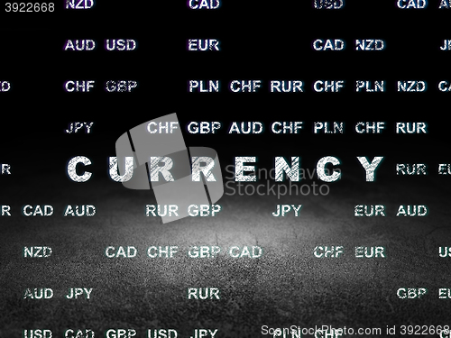 Image of Currency concept: Currency in grunge dark room