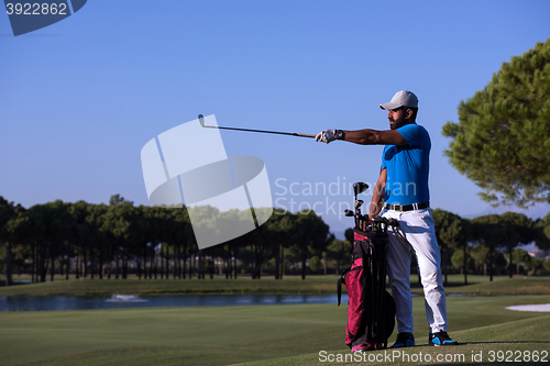 Image of golfer  portrait at golf  course