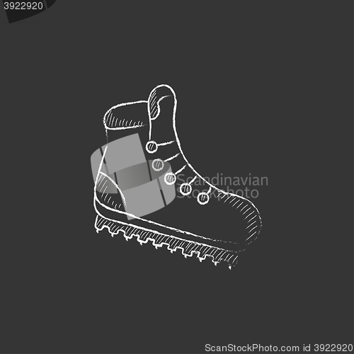 Image of Hiking boot with crampons. Drawn in chalk icon.