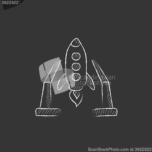 Image of Space shuttle on take-off area. Drawn in chalk icon.