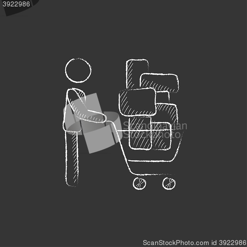 Image of Man pushing shopping cart. Drawn in chalk icon.