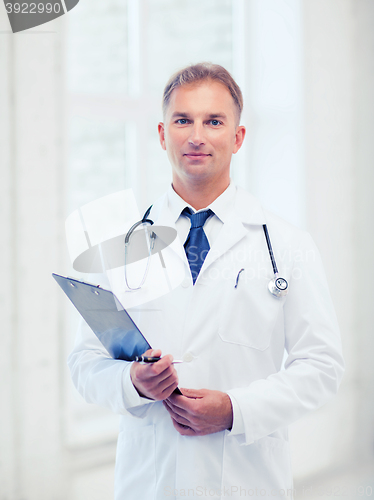 Image of male doctor with stethoscope and clipboard
