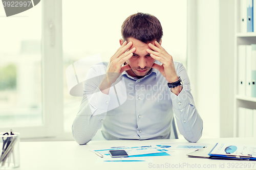 Image of close up of businessman with smartphone