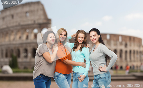 Image of group of happy different women over coliseum