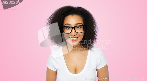 Image of happy african woman or student girl in eyeglasses