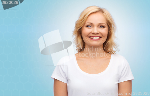 Image of smiling woman in blank white t-shirt