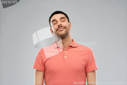 Image of laughing man over gray background